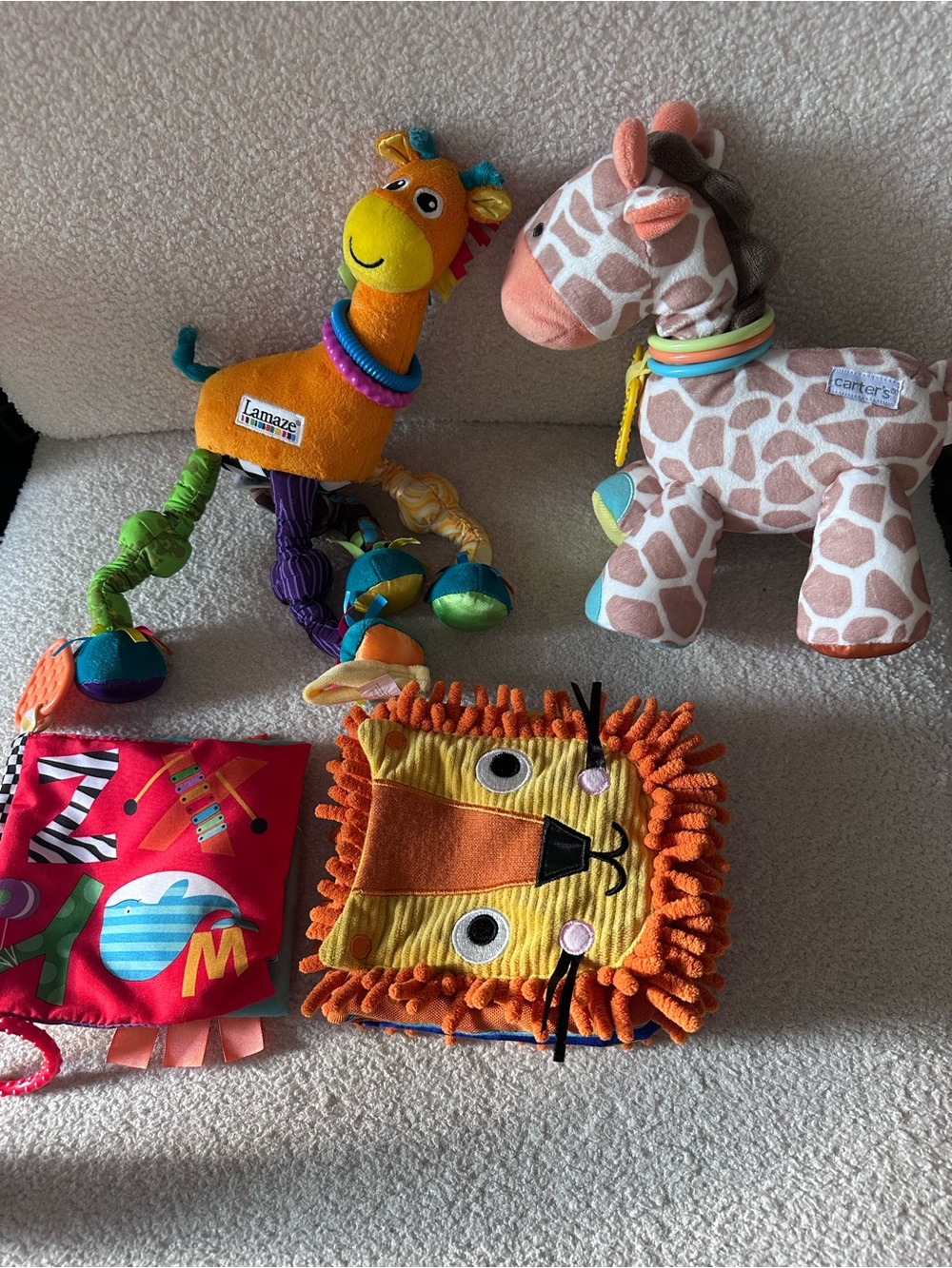 Lamaze Orange Giraffe and Carter's Giraffe Baby Plus and 2 sensory books